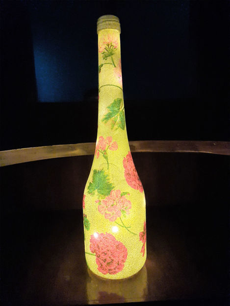 Picture of Geraldine on glass bottle decoupaged