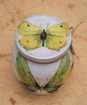 Picture of Big yellow-green butterflies on matki jar decoupaged