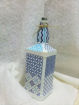 Picture of Blue moroccan tiles on glass bottle decoupaged